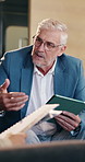 Businessman, tablet and meeting in lounge at office for discussion, insight or review at insurance company. Mature broker, tech and team with planning, documents or feedback at risk management agency