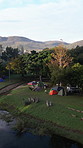 Drone, tent and camping in nature, vacation and environment with landscape. Outdoor, lake and location for fun, forest or countryside with adventure, explore and summer holiday with journey in Canada