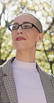 Businesswoman, walk and commute outdoor with vision, real estate career and entrepreneurship idea. Low angle, female person and realtor thinking with glasses, inspiration and travel journey for work.