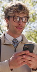 Park, walking and businessman with mobile for travel, online communication and check work schedule. Smile, message app and employee outdoor with phone for digital task list, review email and commute