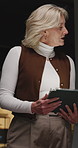Tablet, discussion and businesswoman in office for meeting on finance forecasting on investment. Digital technology, presentation and mature financial manager with company asset prediction for budget