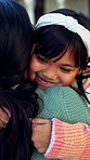 Hug, smile and teacher with child at school for bonding, learning or education together outdoor. Happy, love and female educator embracing girl kid for development, growth or connection at academy.