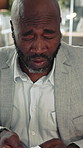 Business, black man and sneeze with tissue in office from allergies, sinus symptoms and burnout. Sick, mature person and breathing from hayfever, blocked nose and influenza discomfort in workplace