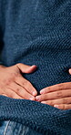 Man, hands and sick with massage for stomach ache, indigestion problem or inflammation from diarrhea. Person, abdomen pain and medical issue with constipation, bad gut health or bloating from gastro.