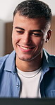 Happy man, reading and good news with laptop in home for social media, email or network. Male person, freelancer or smile with computer for online connection, communication or research in house