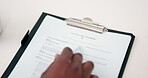 Hands, document and reading testament in home for last will, asset distribution and security. Above, person and review clipboard at table for legal compliance, estate planning or terms and conditions