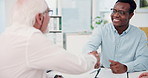 Meeting, handshake and old man in office with insurance agent, agreement or planning for retirement. Happy, senior person and worker shaking hands in agency for policy discussion, deal and thank you.