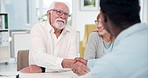 Greeting, handshake and old couple in office with insurance agent, meeting or talk for retirement. Married, senior people and worker shaking hands in agency for policy discussion, planning or welcome