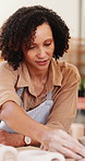Teacher, woman and help in pottery class with clay mold, guide client or instructions for sculpture. Mature person, teaching or talk in workshop with lesson, creativity or design advice for ceramics.