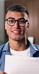 Video call, cv and face of man in office for online meeting with job interview for recruitment process. Happy, documents and portrait of male hr manager with resume for virtual hiring discussion.