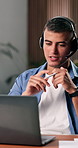 Businessman, laptop and talking with headset in office for online advice or customer service. Man, consultant or agent speaking with mic on computer for communication, help or virtual assistance