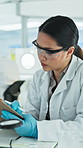 Woman, scientist and reading clipboard at lab for research, medical study and experiment results. Person, writing and checklist with observation notes, investigation report and information on vaccine