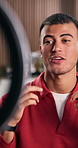 Man, ring light and phone with welcome for live stream, content creation and social media in home. Streamer, influencer and gen z person with tech for broadcast, performance and online introduction