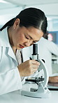 Science, microscope and woman with tablet in lab, sample analysis and observation for pathology research. Typing, tech and scientist with investigation for pharma study, virus notes and medical trial
