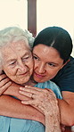 Smile, old woman and hug with daughter at house for love, parental affection and compassion. Happy, senior mother and embrace with adult child, connection and family relationship at retirement home