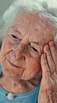 Elderly woman, headache and stress in home with migraine, chronic pain and brain fog. Retirement, frustrated old person and tension in house with high blood pressure, hypertension and vertigo
