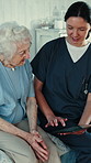 Old woman, talking and doctor in hospital, tablet for test results and online schedule. Patient, medical service and happy people in clinic, internet and tech for recovery, healthcare and support