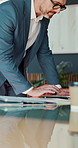 Business, man and laptop with paperwork in office for data analysis, policy update or forecasting. Finance manager, mature person or tech with statement for financial reporting, compare charts or ROI