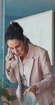 Business, woman and laptop with phone call in office for debt review, market update or loan advice. Financial advisor, mature person or mobile chat for insurance claim, explain policy or negotiation