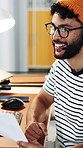 Headset, video call and businessman in office with documents for online meeting for creative project. Professional, talking and male magazine editor on virtual discussion with mic at startup agency.