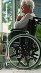 Old woman, thinking and happy with wheelchair at window, memory or reflection in retirement home. Elderly person with disability, perspective and rehabilitation for injury, stroke or healing at house