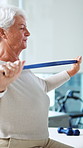 Physiotherapy, resistance band and senior woman for rehabilitation, wellness and medical service. Healthcare, retirement and physical therapist with patient for recovery, support or mobility exercise