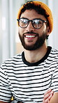 Face, creative and man in office with arms crossed, glasses and smile for career growth in marketing. Confident, happy person and spectacles in workplace with ambition, advertising job and about us.