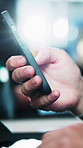 Cellphone, hands and businessperson in office with texting, networking or communication on mobile app. Technology, flare and employee on phone for email, contact or connectivity in workplace.
