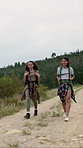 Backpacking, hiking and girl friends outdoor with adventure, discovery or exploring on vacation. Walking, nature and female people trekking for travel with health, wellness or bonding on holiday.