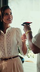 Love, cheers and couple in home with red wine, celebration and date for bonding or marriage. Toast, woman and man with alcohol for anniversary, commitment and romance together with beverage in house