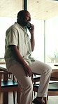 Phone call, black man and discussion in home with smile, planning and networking. Mature person, connection and happy with tech, app and communication for conversation and laugh with funny joke