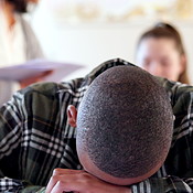 Disappointed, classroom and boy with test results for education fail ...