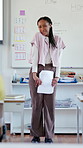 Classroom, presentation and applause with girl for development, education or assessment. Public speaking, success or oral report with document for student, knowledge and speech exam for scholarship