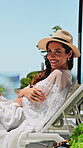 Resort, smile and face of woman with arms crossed outdoor for summer holiday, laughing or relax. Sunshine, mature person and unwind on deck chair at lodge for vacation break, travel adventure or joke