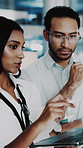 Business, teamwork and people with laptop in meeting, programming or software development on website. Collaboration, man and woman with stylus for IT assignment, programmer and discussion with tech