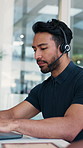 Headset, man and call center consultant in office with online consultation, conversation or crm. Talking, mic and male technical support agent typing with helpdesk for customer service or contact us.