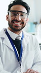 Happy man, face and scientist with goggles in laboratory for medical research or forensic study. Portrait, male person or doctor with smile or protection for investigation, experiement or discovery