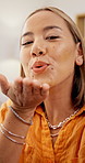 Woman, selfie and blowing kiss with face in home with smile, peace sign and playful with post on web. Asian person, portrait and photography with emoji, smile and pout for profile picture in Cambodia