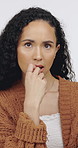 Planning, makeup and woman in studio with ideas, decision or wonder with beauty, cosmetics or glow. Choice, health and person with thinking for facial cosmetology by white background for self care.