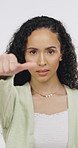 Woman, thumb up and down for vote in studio, portrait and positive opinion for university education. White background, uncertain and person with agreement sign, gesture or negative review for college