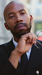 Lawyer, thinking and black man in city, decision for court case results and reflection. Outdoor, African person and attorney in street, professional and contemplation for strategy, choice and mindset