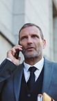 Phone call, outdoor and businessman in city for contact, communication or networking for finance deal. Talking, cellphone and financial manager on mobile discussion for investment negotiation in town