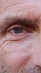 Health, vision and face of man with eyecare for optical assessment, glaucoma exam and wellness. Optometry, mature person and eyes closeup for healthcare, sight correction and contact lens for myopia