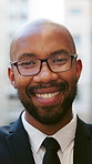Smile, outdoor and face of black man in city with confidence for finance career growth. Happy, professional and portrait of male financial manager with pride for corporate job opportunity in town.