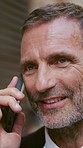 Phone call, walking and businessman in city for communication, contact or networking for finance deal. Talking, cellphone and financial manager on mobile discussion for investment negotiation in town