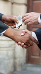 Judge, men and handshake in city for law deal, case agreement and judicial partnership. Lawyer, shaking hands and collaboration for legal settlement, dispute resolution and goodbye with closeup
