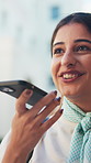 Business, phone call and woman in city, loudspeaker and digital app for communication. Mobile user, tech and person in street, employee and online chatting with voice memo for reminder and happiness