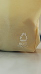 Recycling sign, grocery bag and arrow in home for eco friendly shopping, reuse and package in kitchen. Earth day, sustainability and organic fabric with accountability for environment at apartment