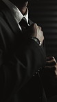 Hands, spy and suit with thinking for secret mission, espionage and danger with insight at office. Person, government agent or assassin with undercover assignment, career and hitman with perspective