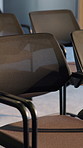 Boardroom, empty and chairs in office for conference, workshop event and seminar. Corporate, furniture and seats in business venue for convention, meeting and presentation for professional audience